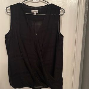 V-Neck Sleeveless top.
